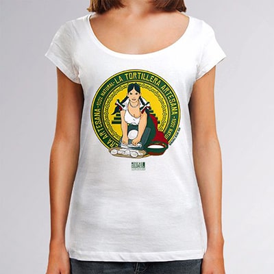 Close-up photograph of a white T-shirt worn by a girl with the Tortillera drawing, a fictional logo of a flour brand named tortillera, focused on a beautiful young woman with generous breasts.